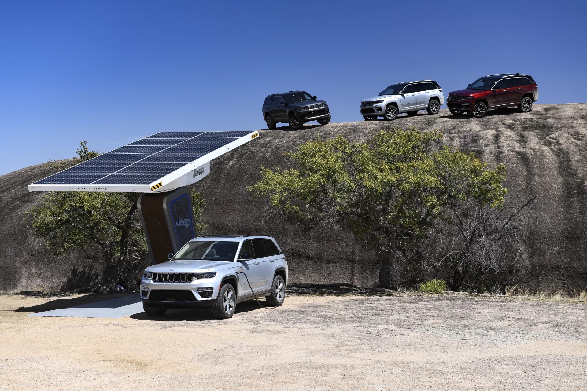 ELECTRIC Hero Images of electric cars with a solar panel