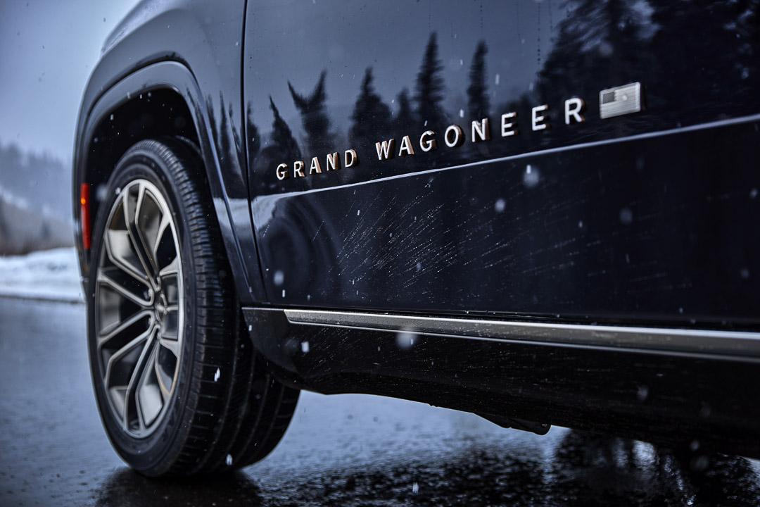 The letters GRAND WAGONEER printed on the door of the 2022 Grand Wagoneer Series III.